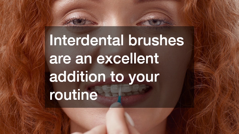 redhead with braces using an interdental brush